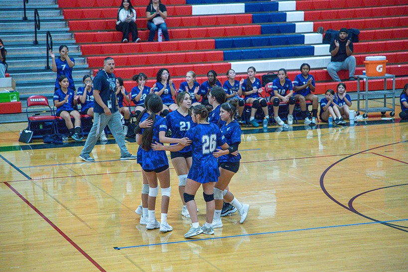 The Mansfeld girls volleyball team goes in for a huddle