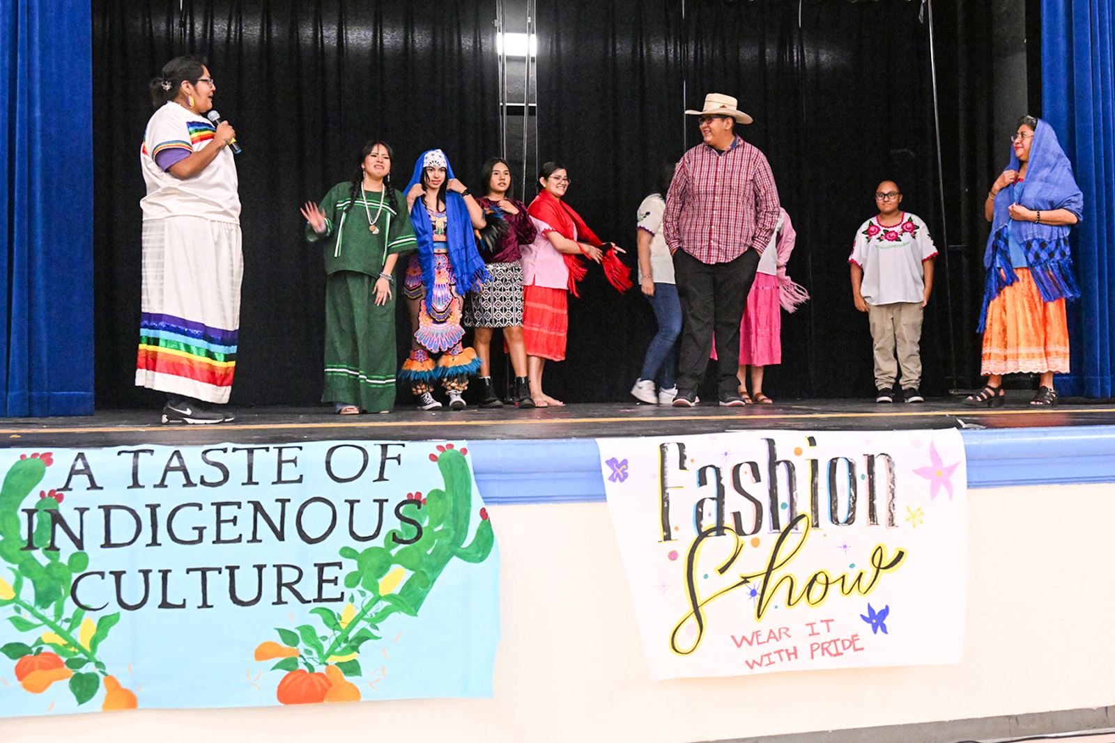 Students and staff show off their Indigenous clothing during the event's fashion show.